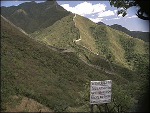 Private entrepreneurs attempt to collect toll along the wall.