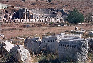 The Odeon, a small theater and the town hall and parlement